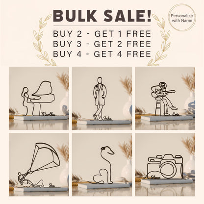 The image is a collage of six different wire sculptures, each depicting a unique scene or object. The sculptures are arranged in a grid format, with two sculptures in each row and three sculptures in each column. The sculptures are set against a neutral background, and the image does not contain any text.